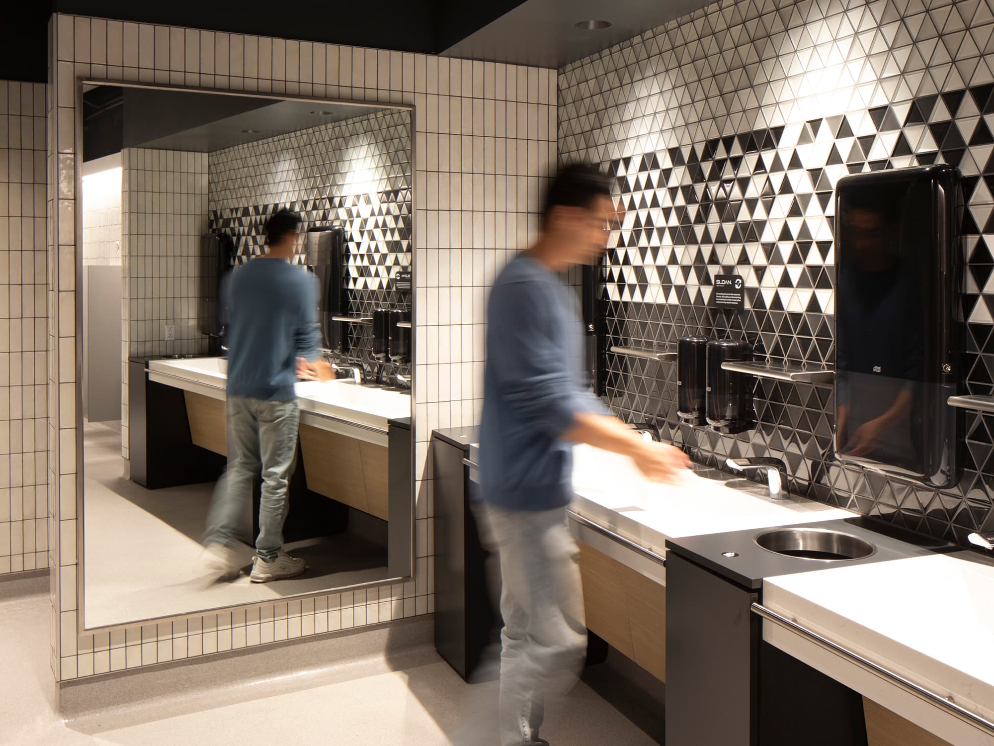 A fan washing hands at Intuit Dome where the NBA Los Angeles Clippers play