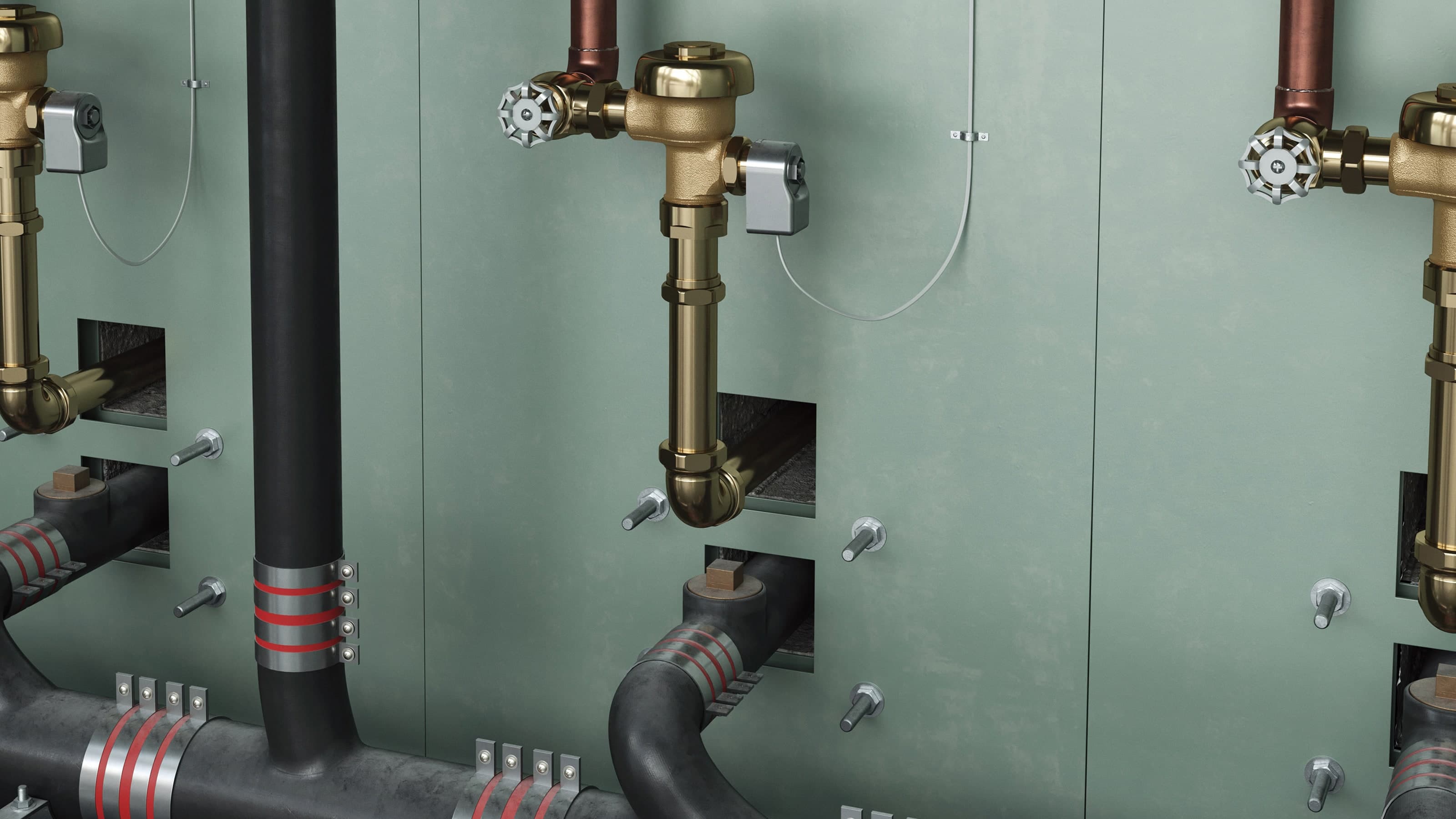 Multiple brass valve assemblies with manual wheel handles connected to copper and black pipes, mounted on a gray industrial wall panel.