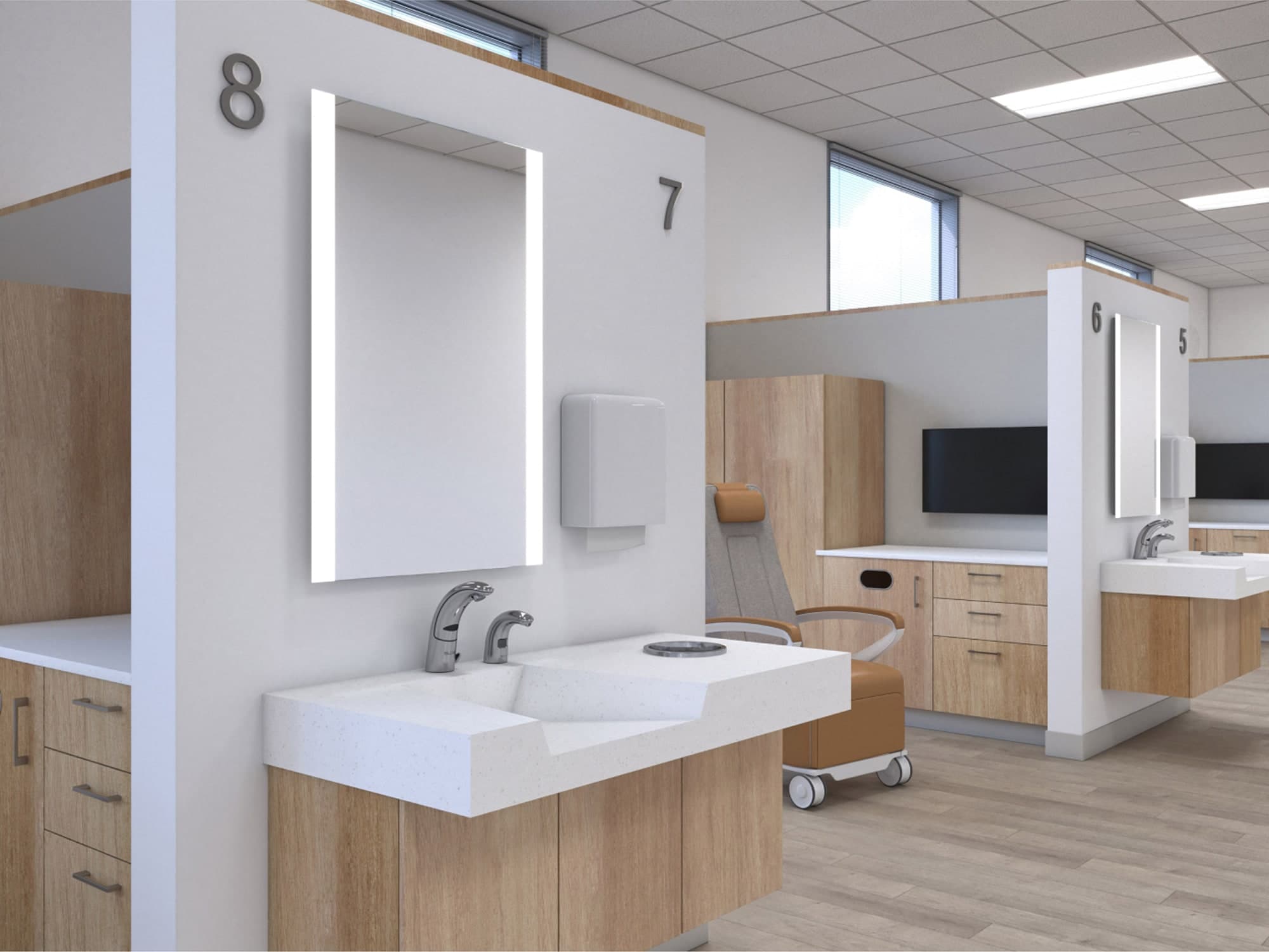 view of a clinic with Sloan mirrors and handwashing sink featuring a soap and faucet combo