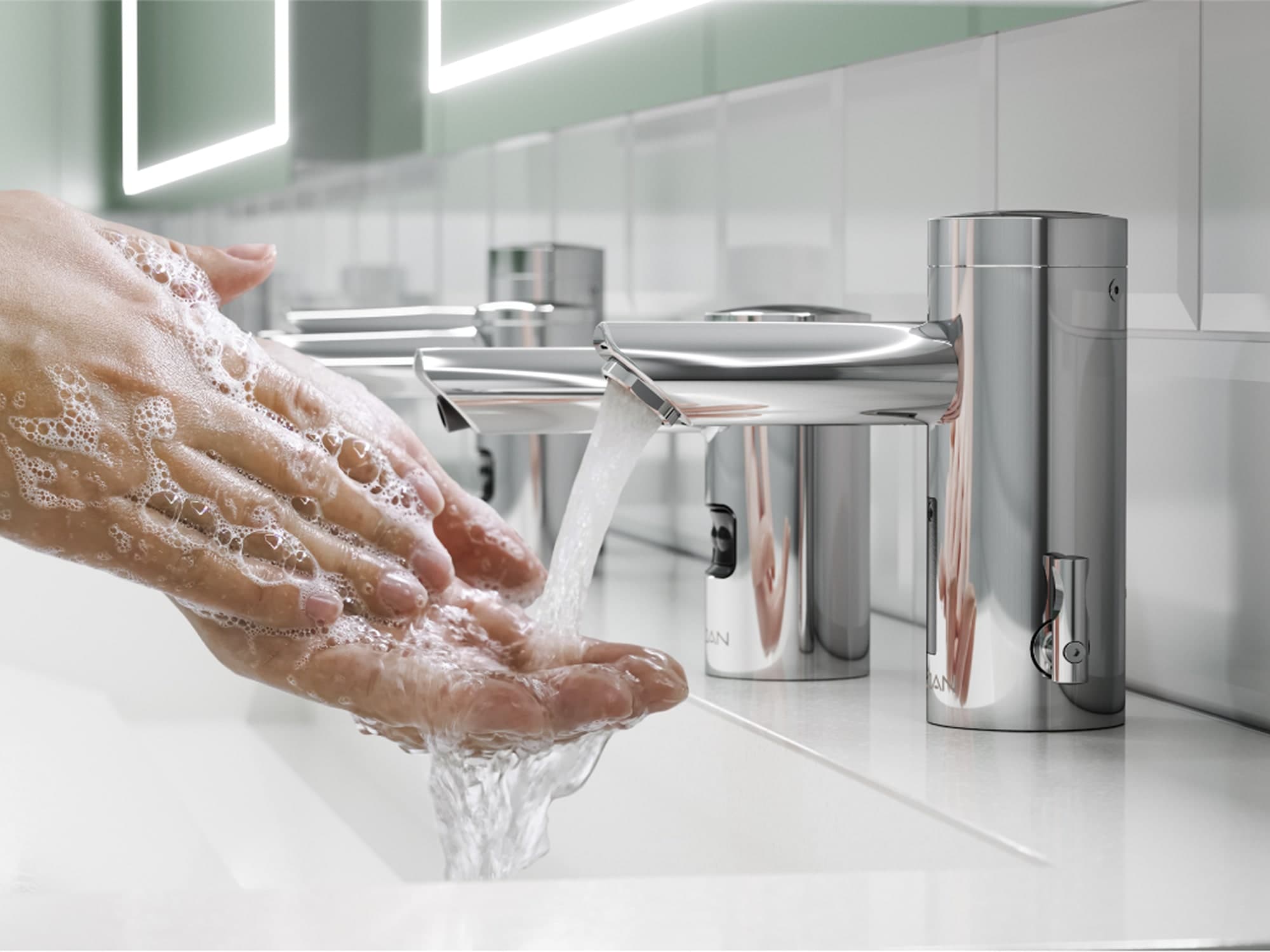 close up of person washing their hands using soap faucet combo