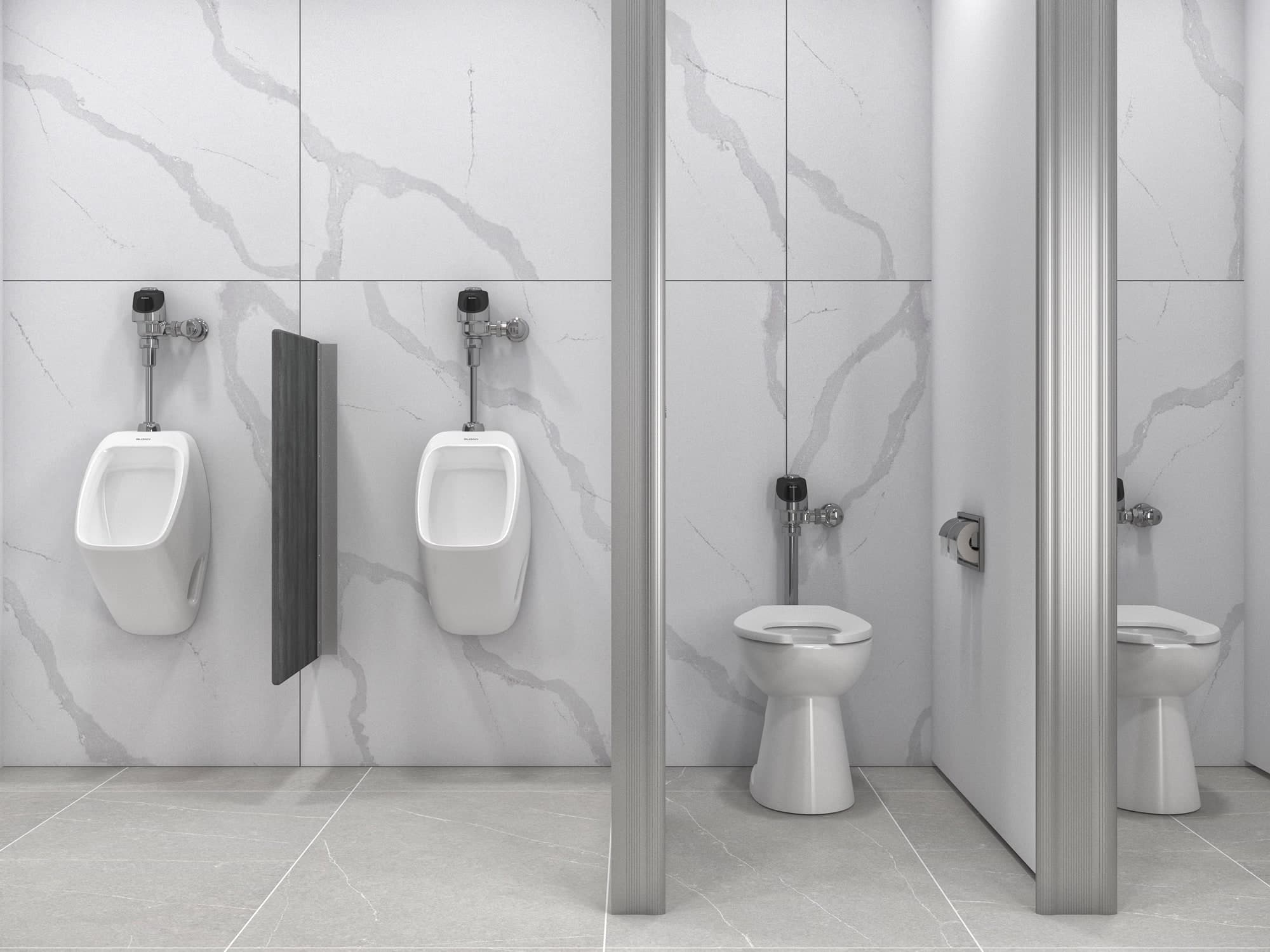 Restroom with urinals, toilets, and marble wall partitions in a modern coworking space.