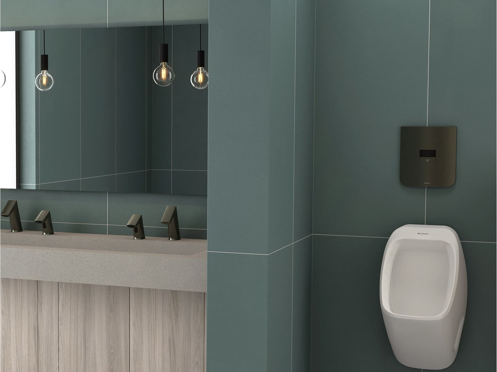 Restroom corner with urinal, dark green wall tiles, and mirror above sink counter.