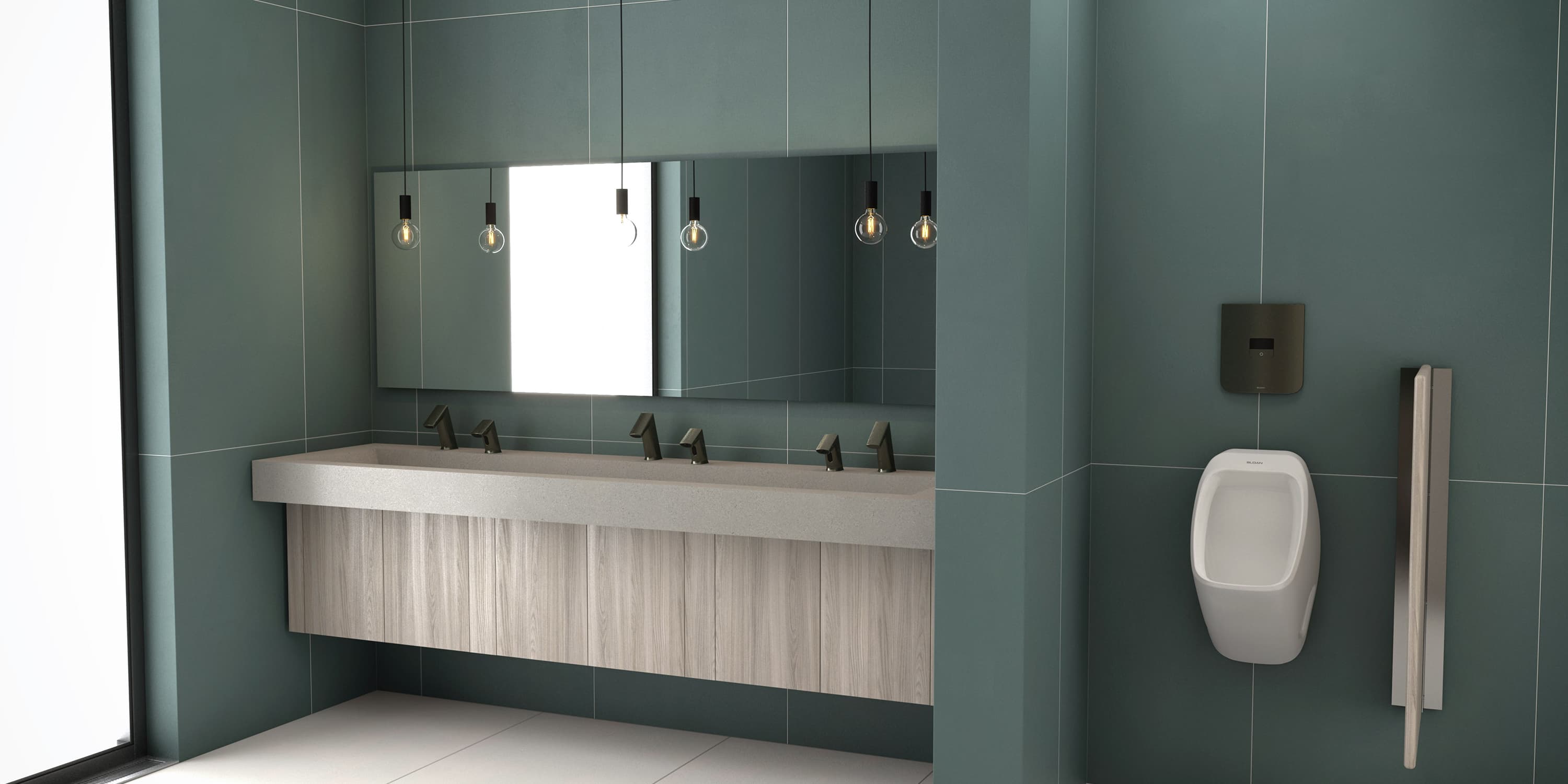 Modern restroom with dark green walls, long wood vanity, and mirrors above multiple sinks.