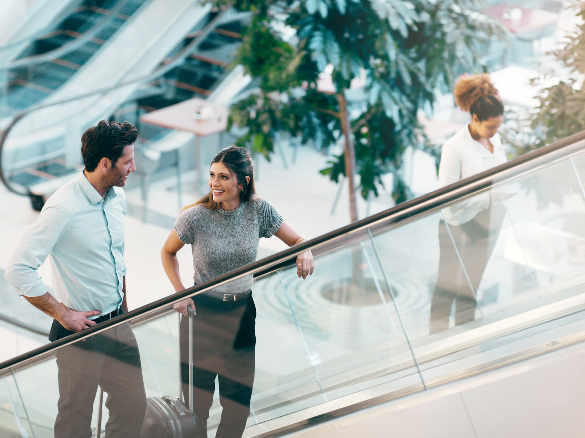 People on ascending on an escalator