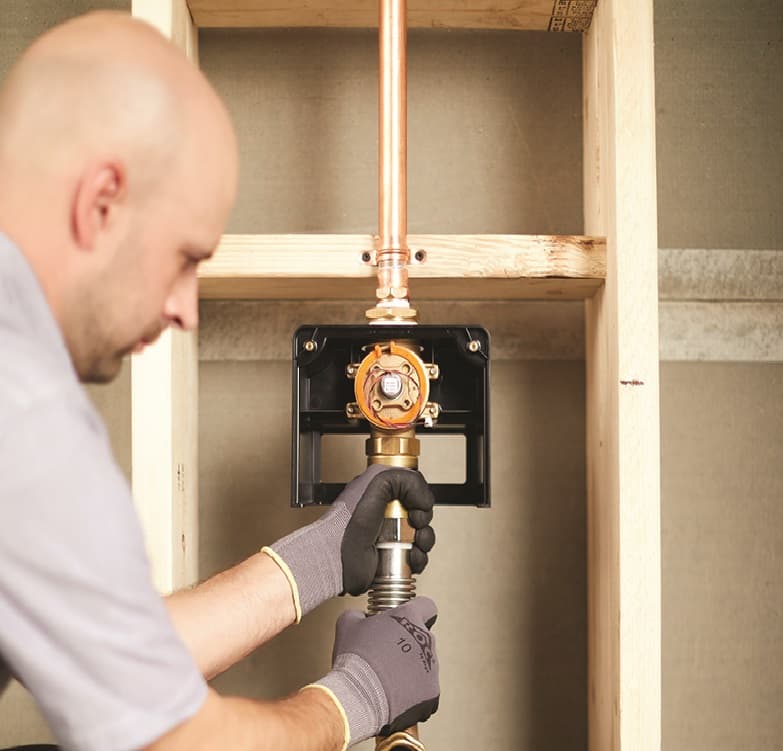Installation of a CX flushometer by a plumbing contractor