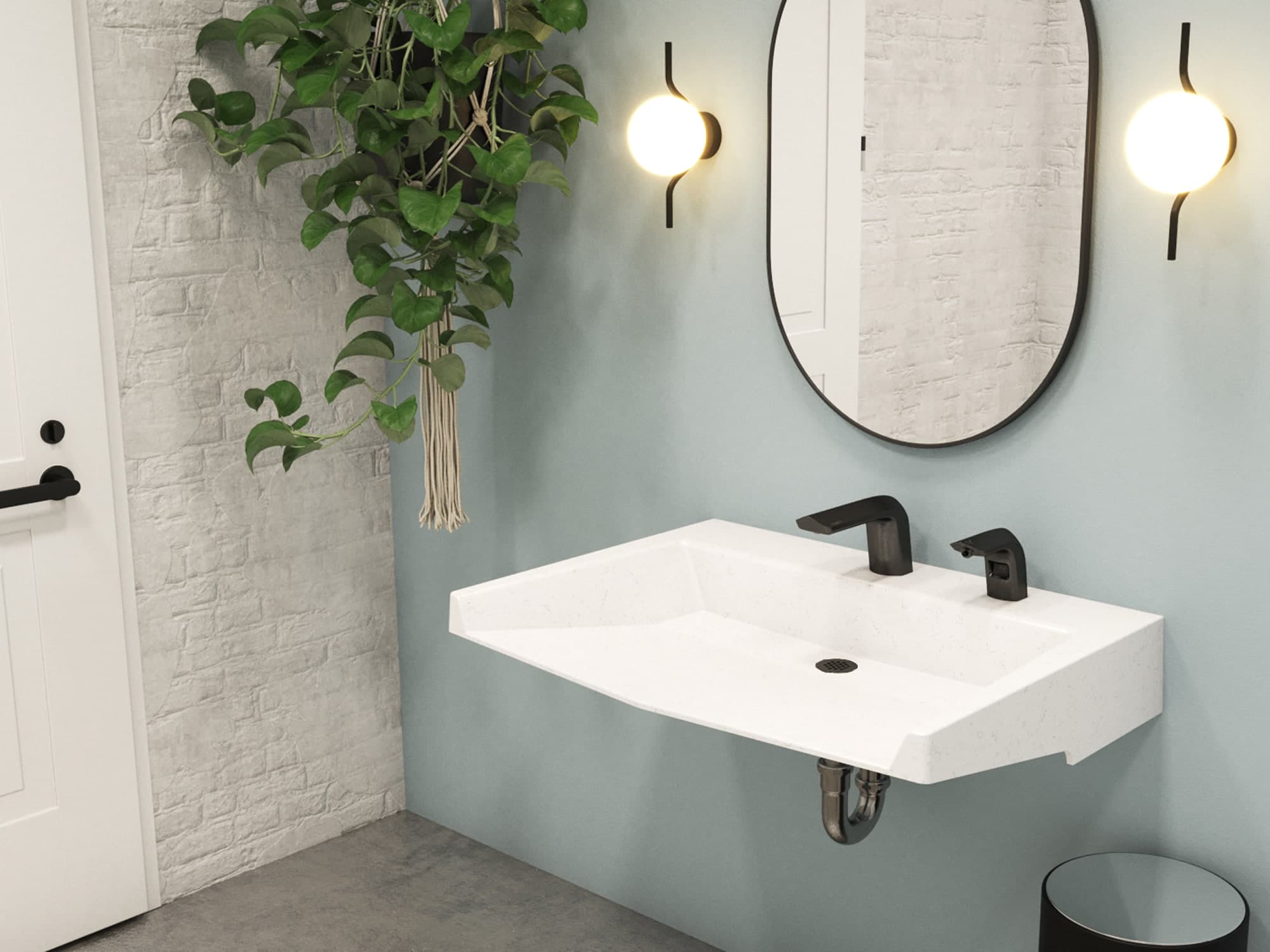 Modern bathroom sink with two black faucets, oval mirror, round wall sconces, and hanging greenery in the corner.