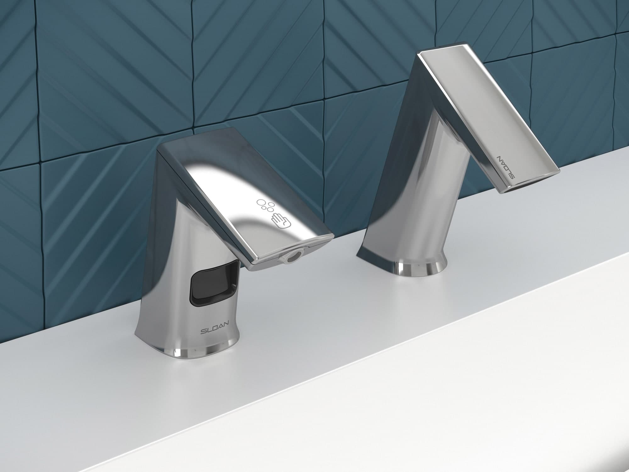 Modern chrome sensor-activated soap dispenser and matching faucet with angular design, installed on a white countertop against a dark blue geometric tile backsplash.