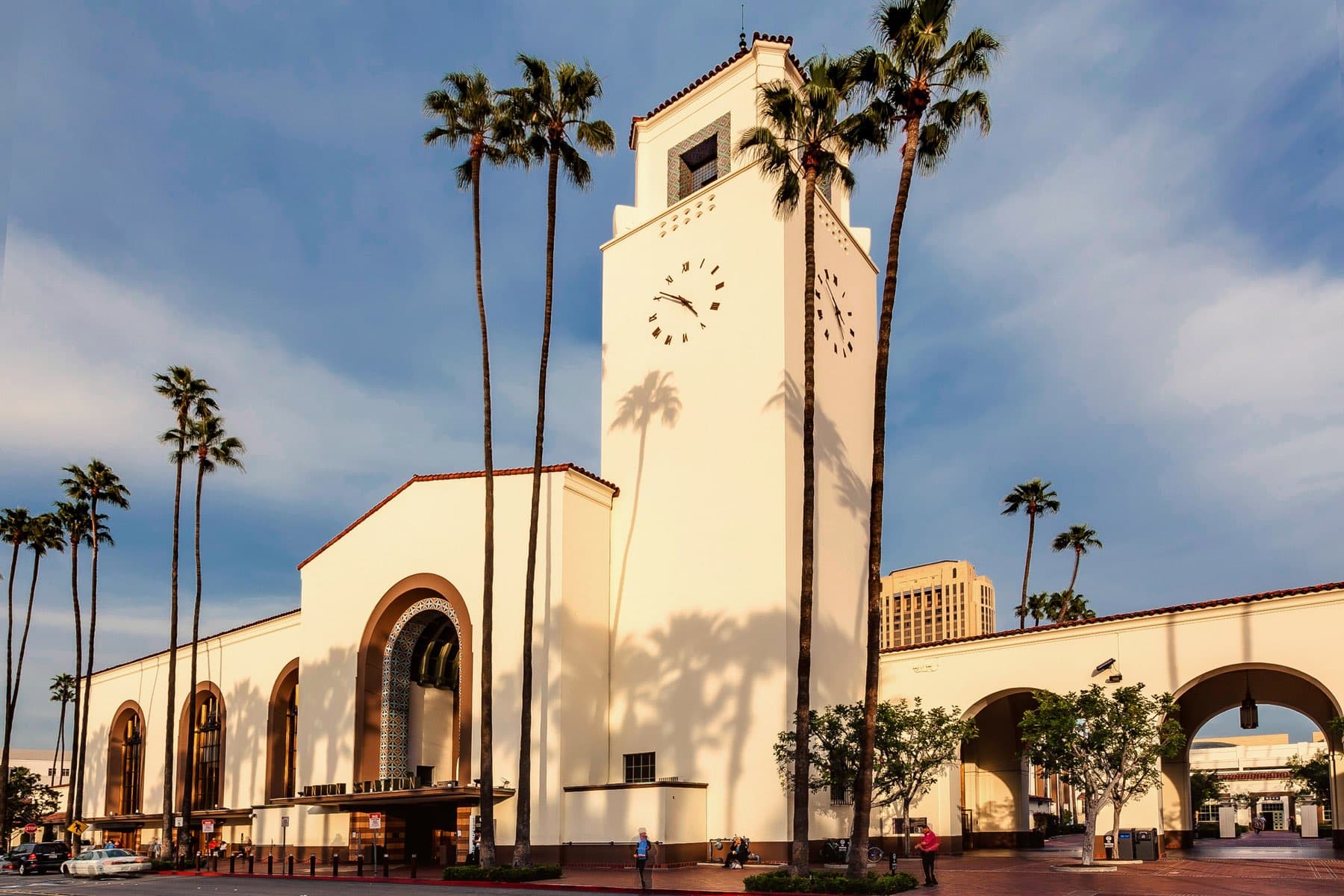view of entrance of LA amtrak station with palm trees