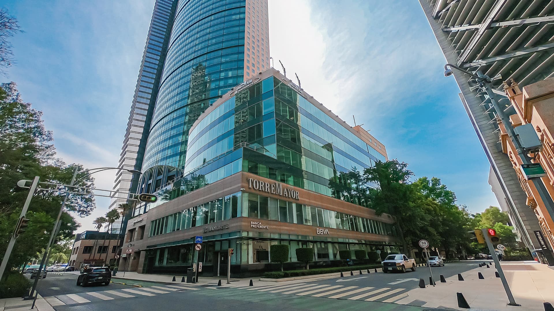 down up view of Torre Mayor building featuring it's glass exteriors
