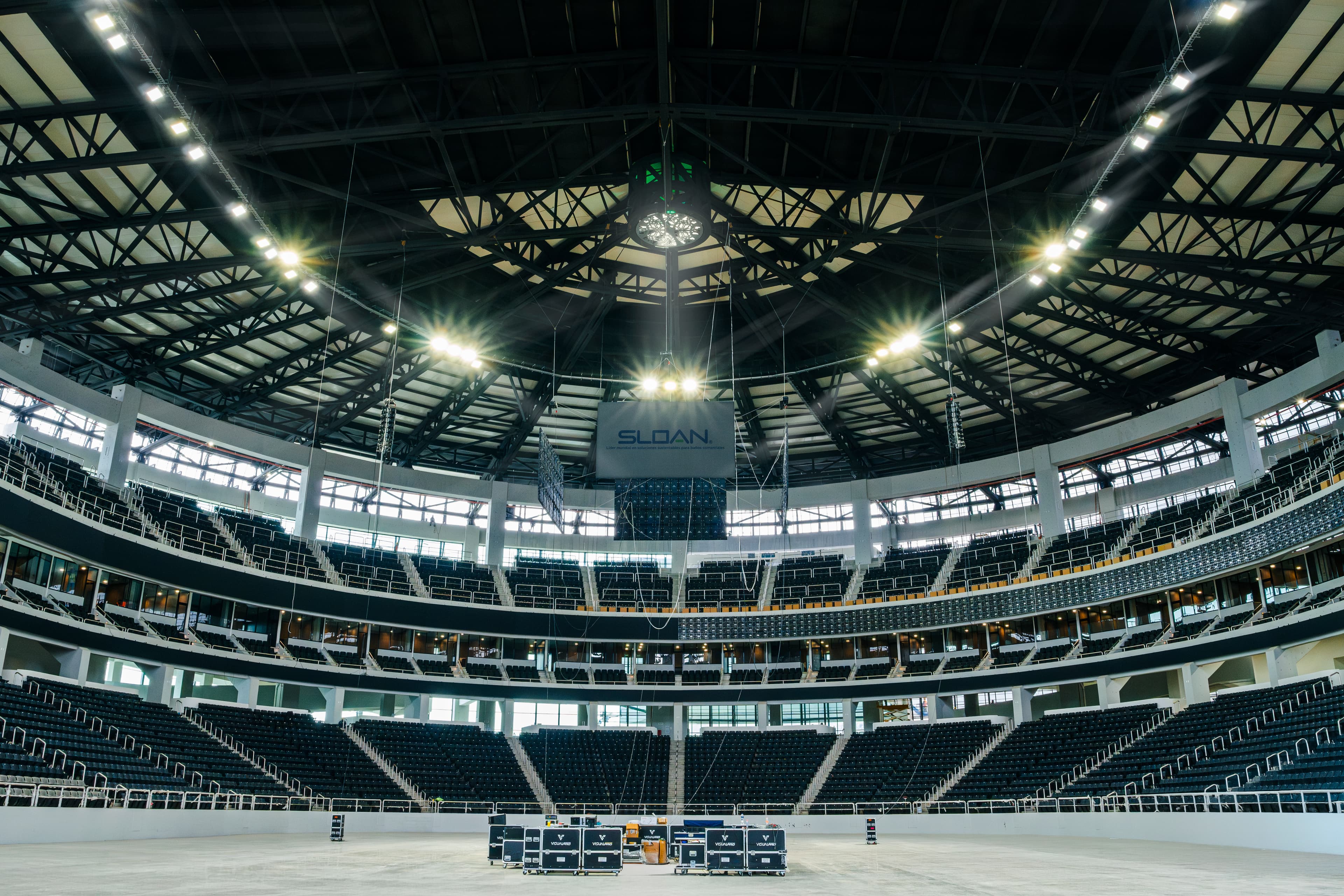 View of the whole arena from the bottom looking up at the stadium lights and the Sloan sign