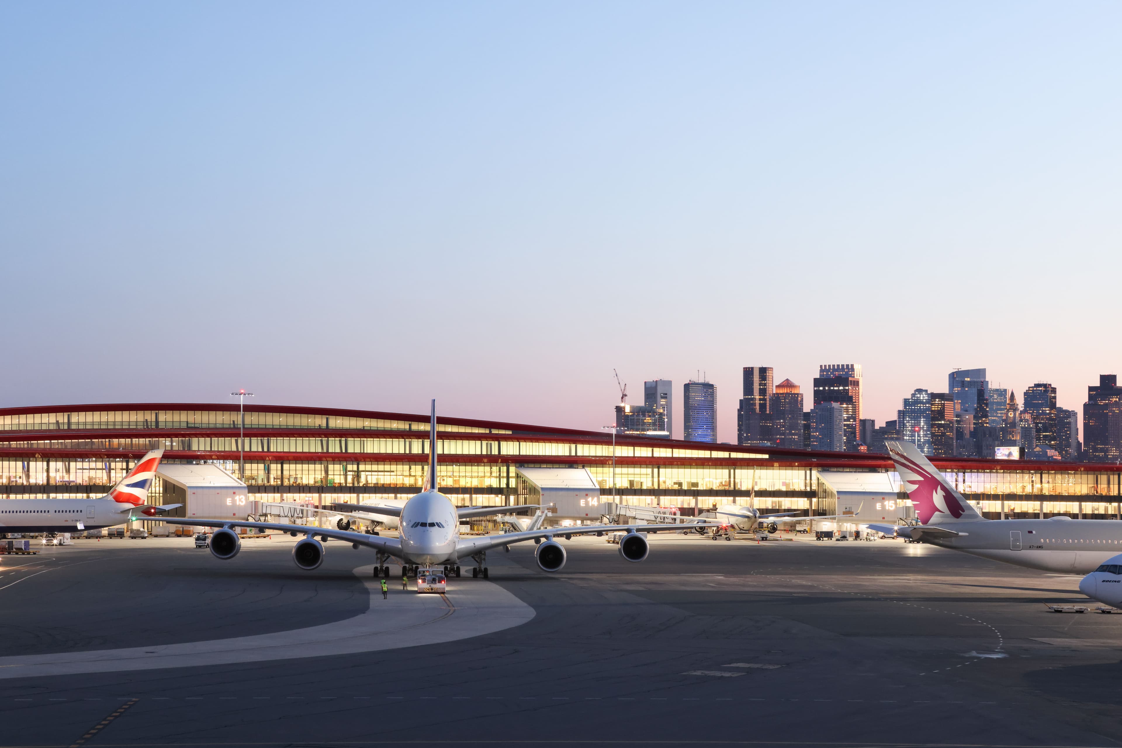 View of airplane with Boston airport and skyline in the background