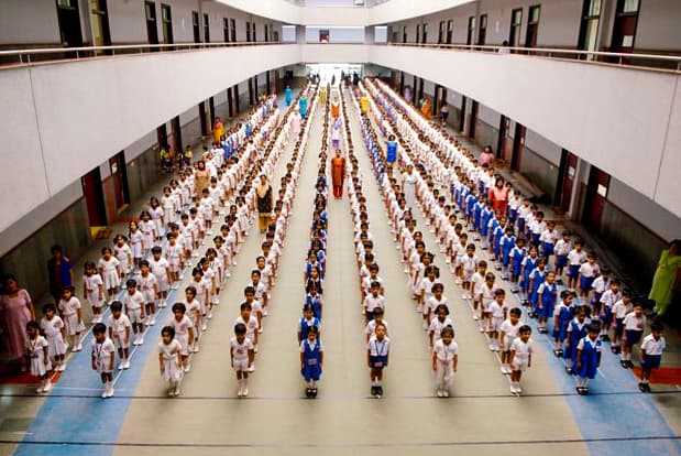 children lined up in rows at the Lokhandwala Foundation School