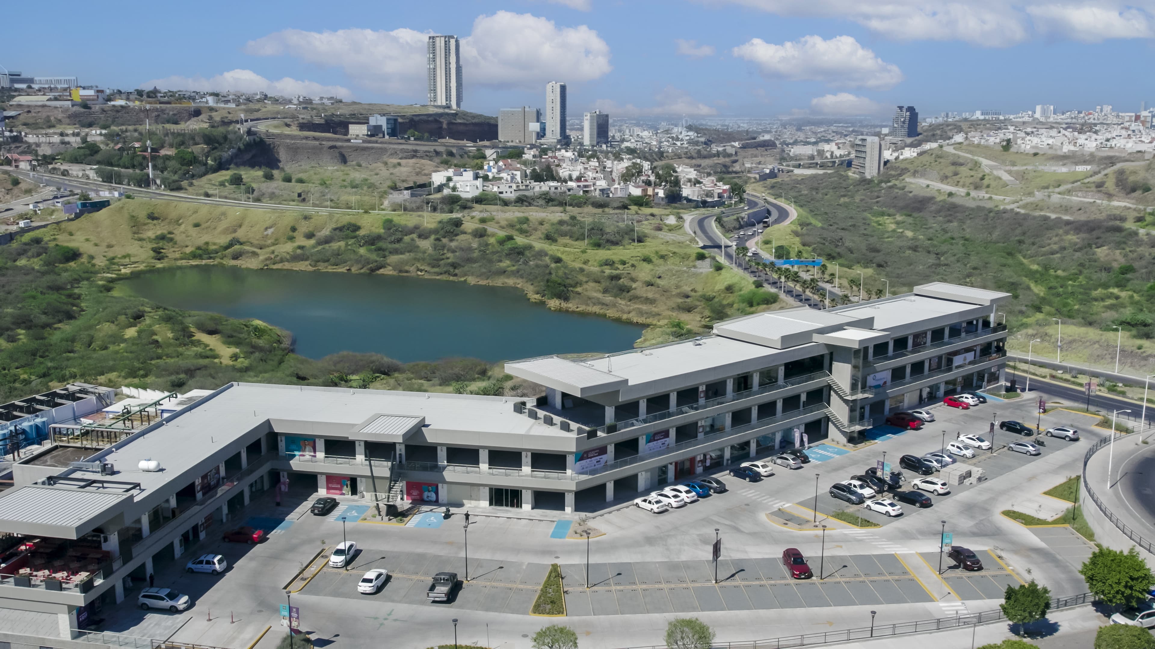 Aerial view of Wolstrat surrounded by green and bodies of water