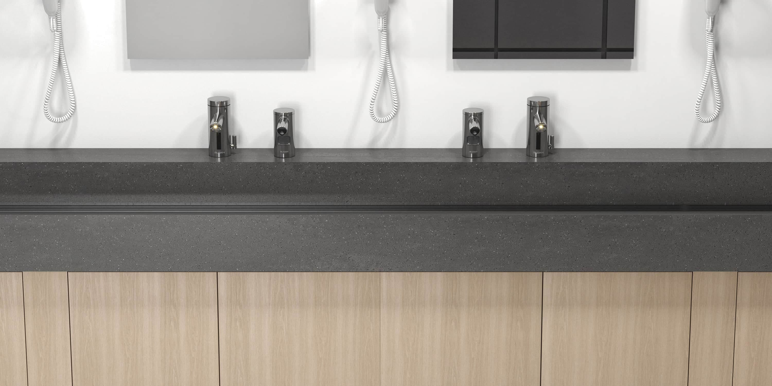 Countertop sinks with dark surface, mirrors, and mounted hair dryers.