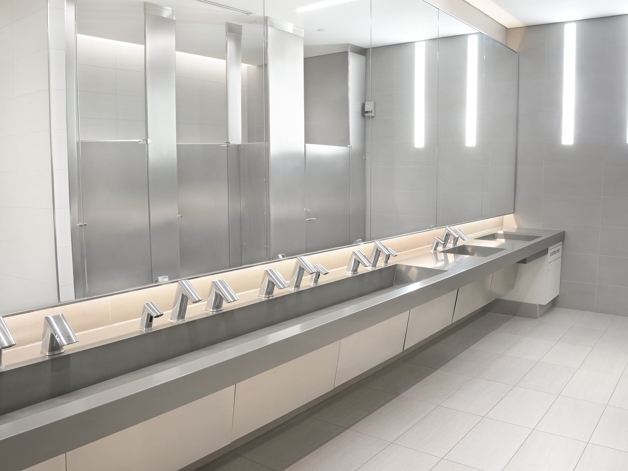 Restroom with a sloan AER-DEC Integrated Sink System.