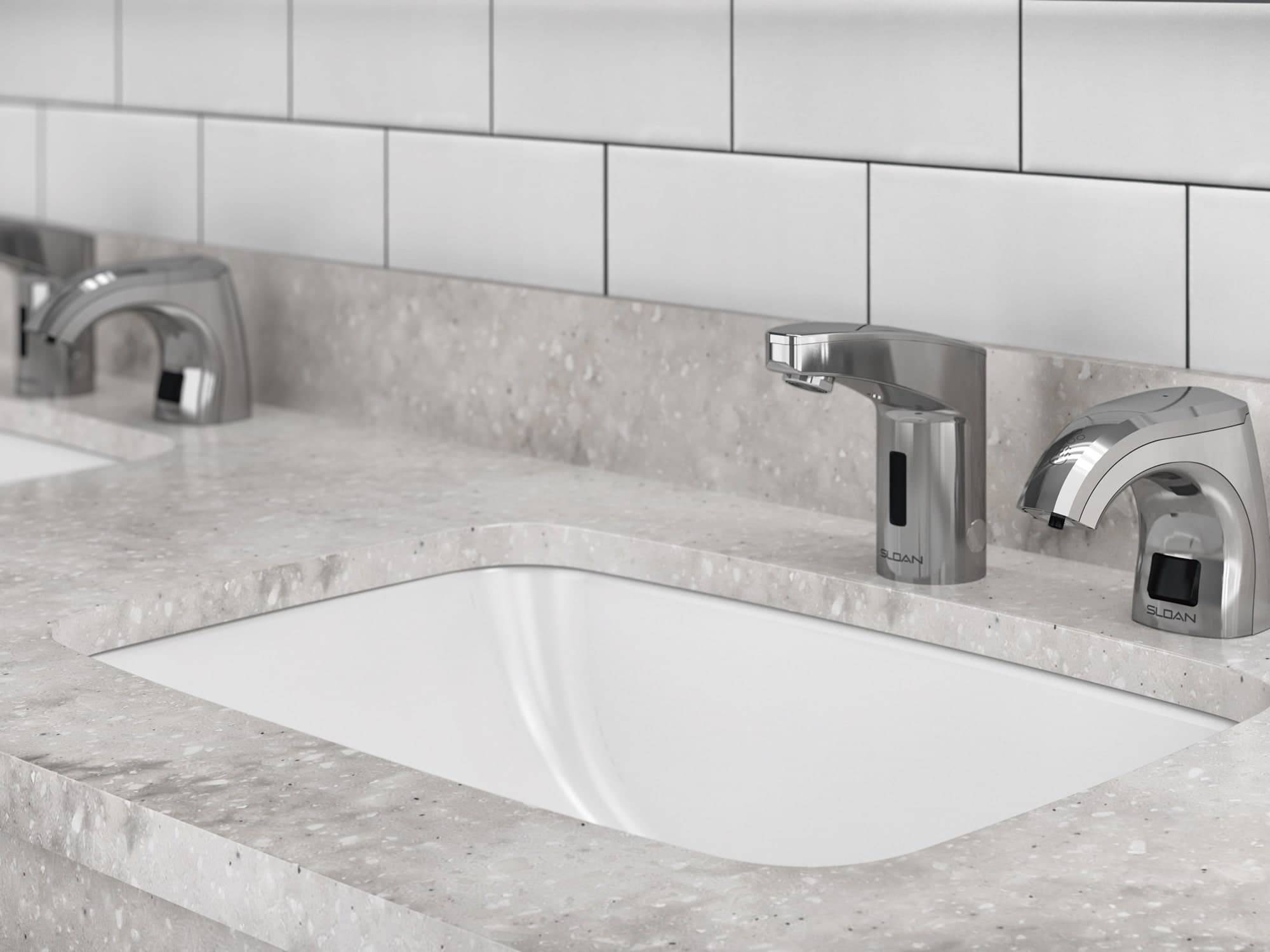 Sloan Top-fill Soap Dispenser on a sink deck in a commercial restroom