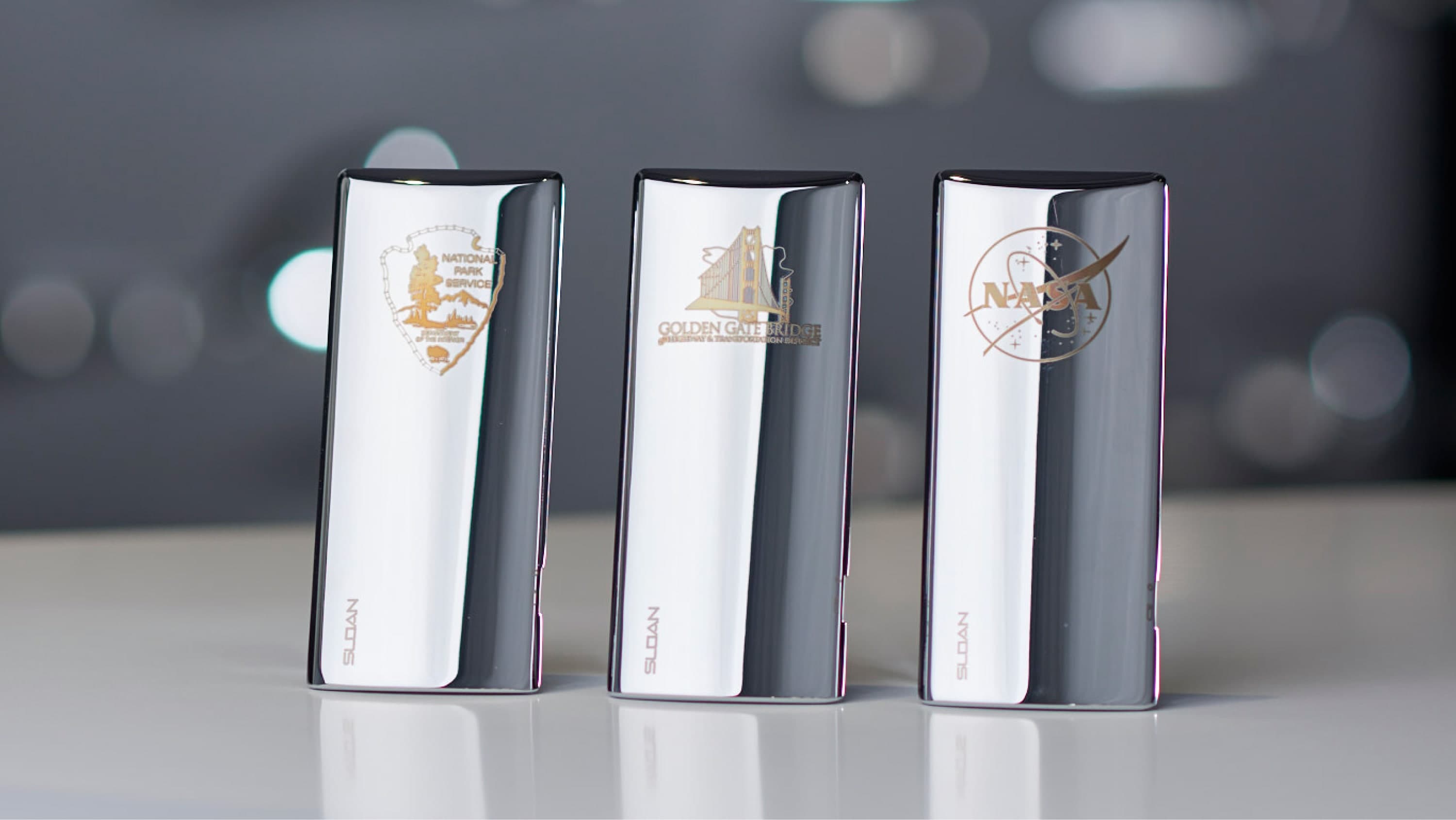 Close-up of custom engraving detail on BASYS faucet surface