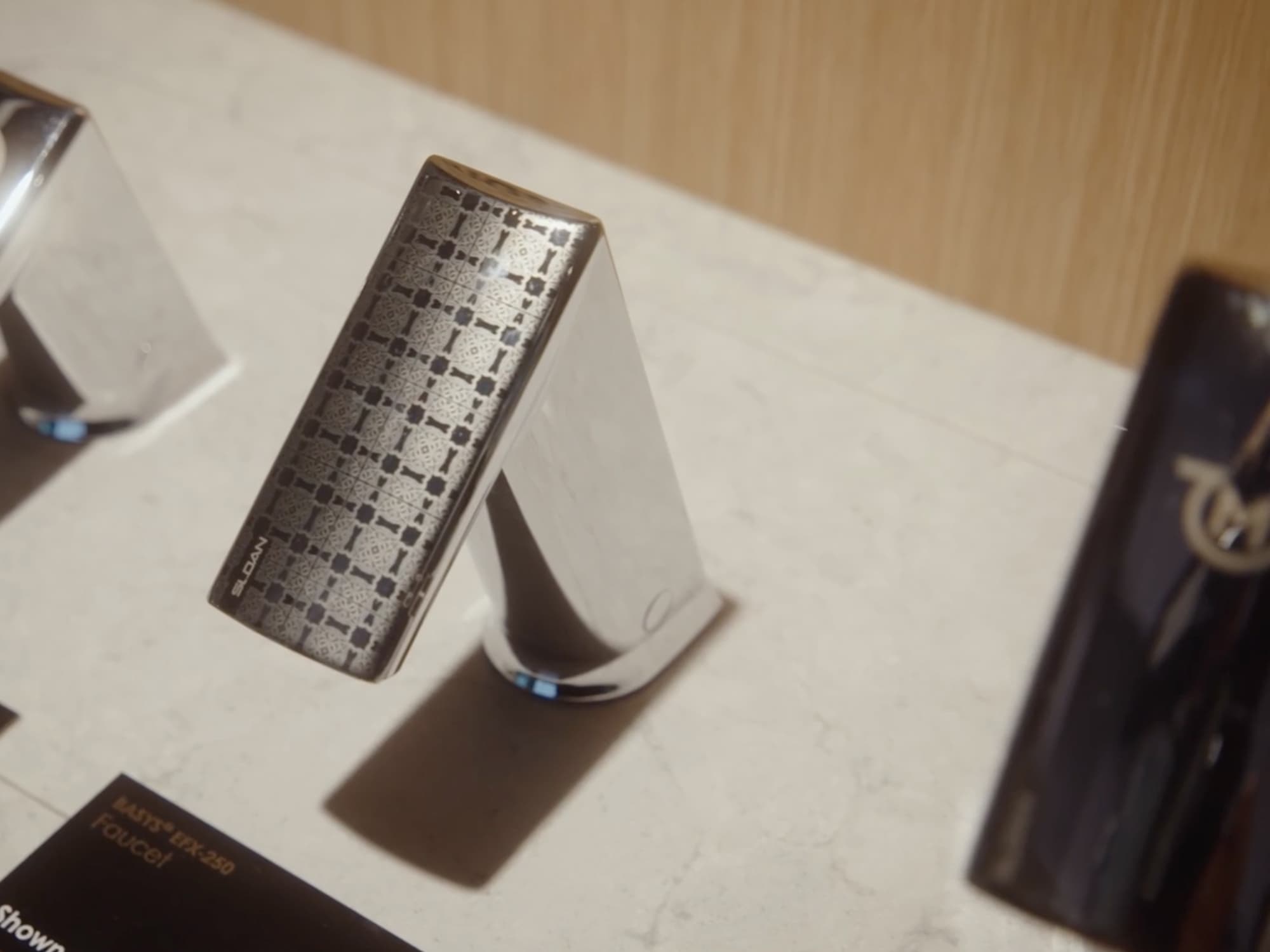 Engraved Basys faucet at the Sloan Fulton Market Showroom