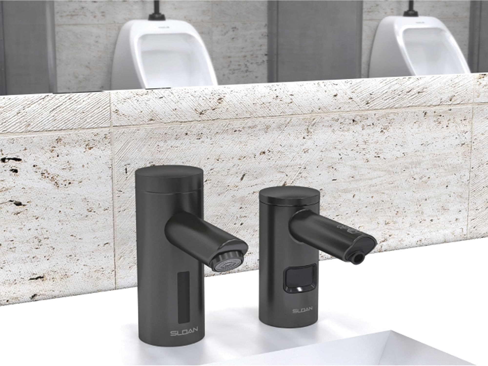 close up of graphite faucet and soap dispenser looking at the mirror with urinals in the background