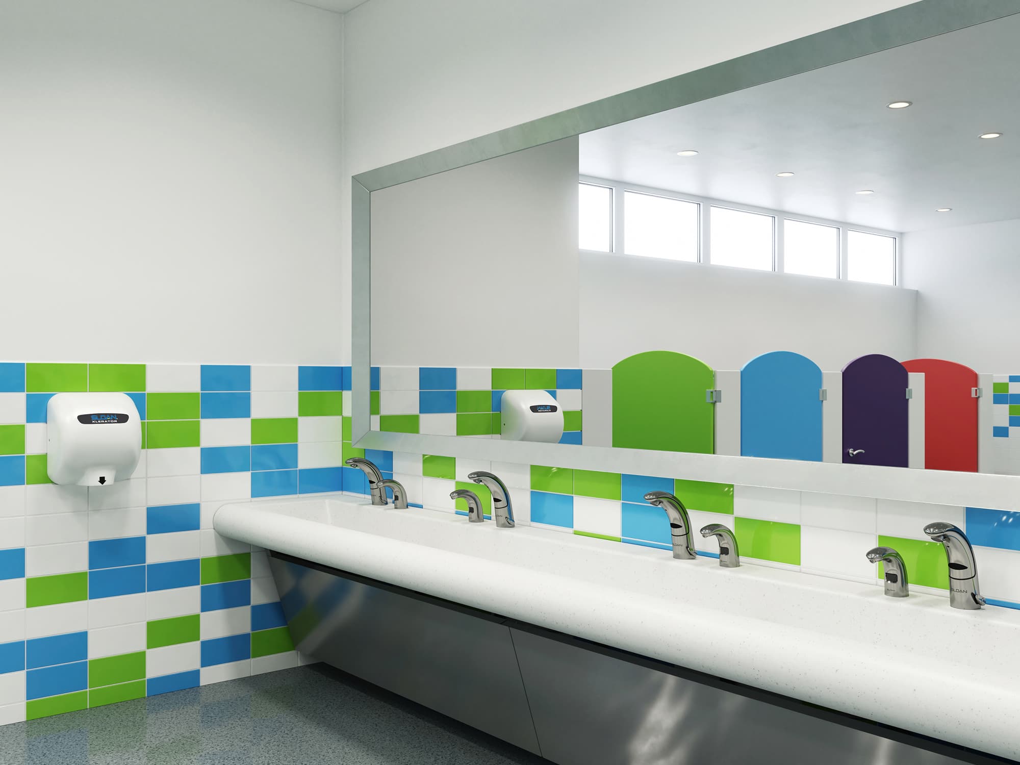 Elementary school bathroom with colorful tiles and Sloan touch-free products