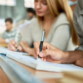 Students taking notes in classroom